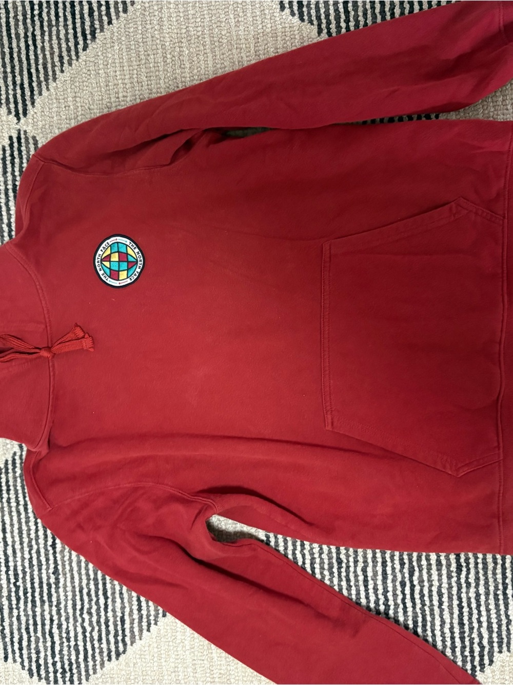 The North Face Red Hoodie with Multicolor Globe Patch
